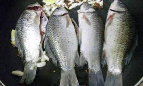 The Art of Crafting Dalis Iconic Sour and Spicy Crucian Carp:A Step-by-Step Culinary Journey