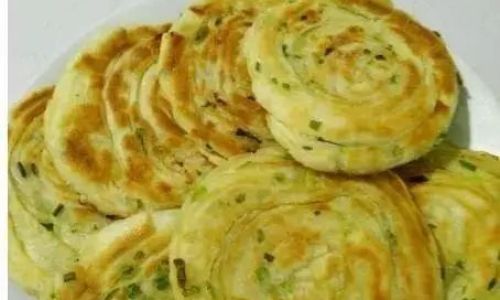 The Origin and Cultural Significance of Scallion Pancakes:A Beloved Chinese Street Food