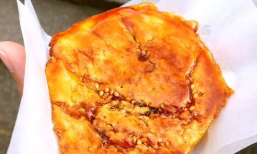 The Origin and Cultural Significance of Scallion Pancakes:A Beloved Chinese Street Food