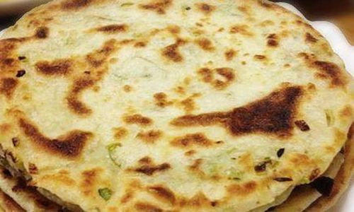 The Ultimate Guide to Crafting Perfect Scallion Oil Pancakes:A Step-by-Step Recipe and Expert Tips