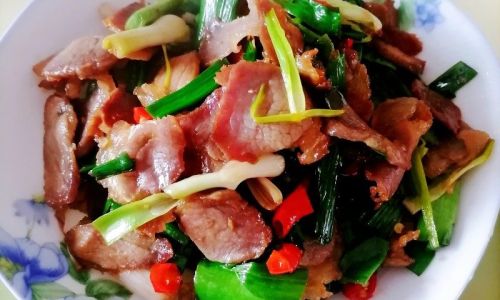 How to Make Preserved Pork Stir-Fry with Garlic Scapes