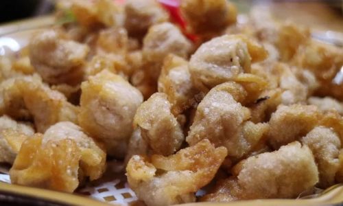 Stir-Fried Osmanthus Sausage:A Fragrant Journey Through Traditional Chinese Cuisine
