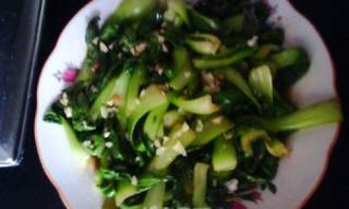 The Sizzling Symphony of Stir-Fried Bok Choy:Mastering the Art of Bàochǎo Yóucài in Chinese Cuisine