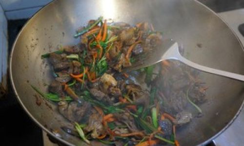 Mastering the Art of Stir-Fried Lamb Head:A Flavorful Journey from Kitchen to Table