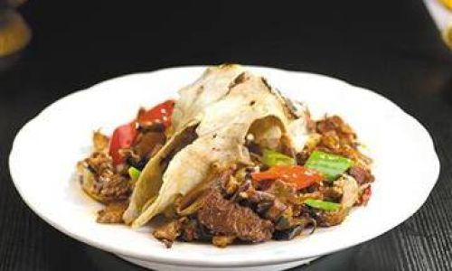 Mastering the Art of Stir-Fried Lamb Head:A Flavorful Journey from Kitchen to Table