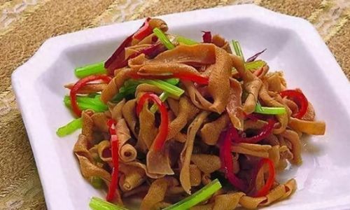 The Fiery Symphony of Stir-Fried Duck Intestines:Mastering the Art of Chinese Culinary Alchemy