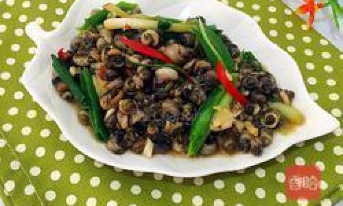The Fiery Symphony of Stir-Fried River Snail Meat:A Culinary Masterpiece from Chinas Kitchens