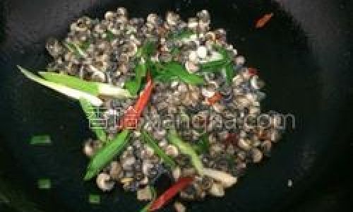 The Fiery Symphony of Stir-Fried River Snail Meat:A Culinary Masterpiece from Chinas Kitchens