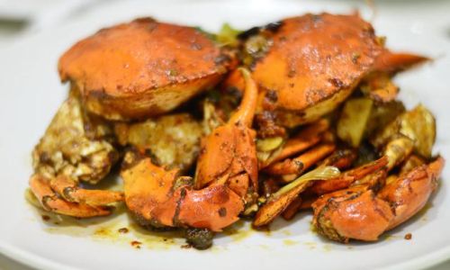 Stir-Fried Crab:A Symphony of Flavors and Culinary Mastery
