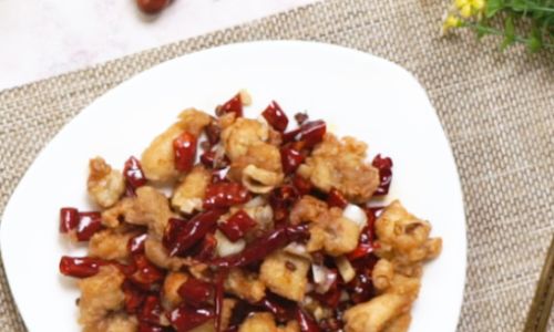 The Ethical Dilemma and Cultural Significance of Stir-Fried Live Chicken:A Culinary Exploration