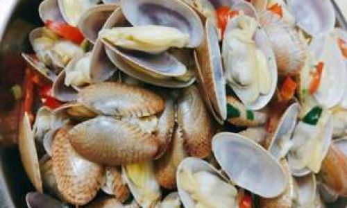 Mastering the Art of Spicy Stir-Fried Clams:A Flavorful Journey from Kitchen to Table
