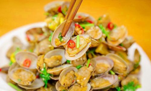Mastering the Art of Stir-Fried Clam Meat:A Flavorful Journey from Kitchen to Table
