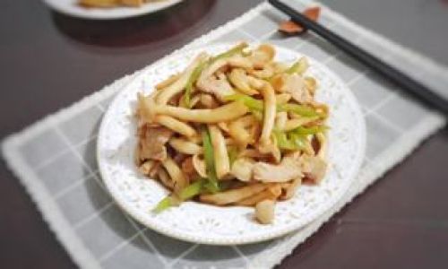 The Art of Stir-Frying:Mastering White Jade Mushroom and Pork Stir-Fry at Home